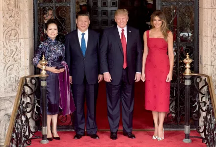 President Donald Trump and First Lady Melania Trump pose for a photo with Chinese President Xi Jingping and his wife, Mrs. Peng Liyuan, Thursday, April 6, 2017, at the entrance of Mar-a-Lago in Palm Beach, FL (Official White Photo by D. Myles Cullen)