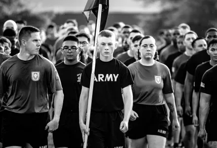 Black and white photo of paratroopers conducting a battalion run in North Carolina