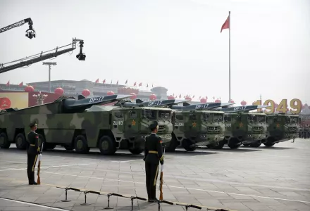 Chinese military vehicles carrying DF-17 ballistic missiles roll during a parade, Oct. 1, 2019. 