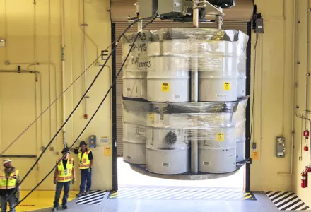 Photo, provided by Los Alamos National Laboratory, showing barrels of radioactive waste are loaded for transport to the Waste Isolation Pilot Plant at the Radioactive Assay Nondestructive Testing (RANT) facility in Los Alamos, N.M