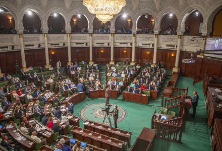Tunisian designated Prime Minister Hichem Mechichi, right, delivers his speech at the parliament before a confidence vote in Tunis, Tuesday, Sept. 1, 2020.