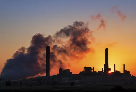 The Dave Johnston coal-fired power plant is silhouetted against the morning sun in Glenrock, Wyoming, July 27, 2018.