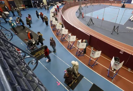Voters mark their ballots during early voting at the Park Slope Armory in Brooklyn, Tuesday, Oct. 27, 2020.