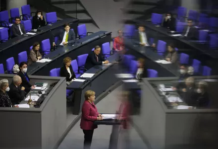 German Chancellor Angela Merkel delivers a speech about German government's policies to combat the spread of the coronavirus and COVID-19 disease at the parliament Bundestag, in Berlin, Germany, Thursday, Oct. 29, 2020.