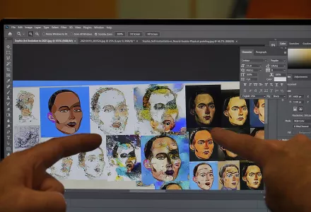 David Hanson shows the Sophia's digital artwork on a laptop at his studio in Hong Kong on March 29, 2021.