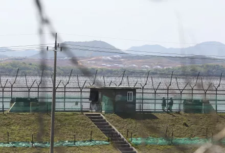 South Korean army soldiers patrol along the barbed-wire fence in Paju, South Korea, near the border with North Korea, Sunday, May 2, 2021.