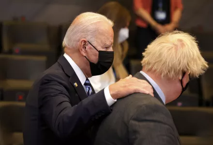 Photo of U.S. President Joe Biden, left, speaking with British Prime Minister Boris Johnson during a plenary session at a NATO summit in Brussels, Monday, June 14, 2021. U.S. President Joe Biden is taking part in his first NATO summit, where the 30-nation alliance hopes to reaffirm its unity and discuss increasingly tense relations with China and Russia, as the organization pulls its troops out after 18 years in Afghanistan. 