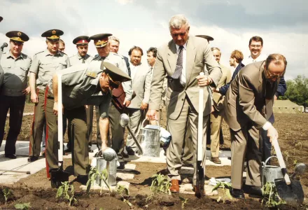 1996 photo with Russian defense minister Pavel Grachev, Ukrainian Defense Minister Valery Schmarov, and U.S. Defense Secretary William Perry (with Ash Carter, Assistant Secretary of Defense for Global Strategic Affairs) planting sunflowers at the site which formerly housed a missile silo at a military base near Pervomaysk, Ukraine.