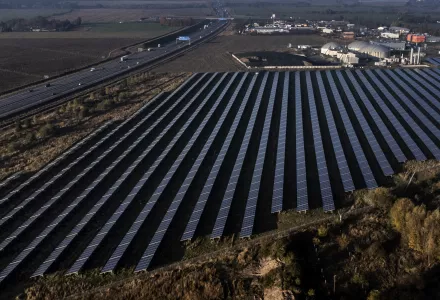 Solar field and biogas plant next to highway in Germany