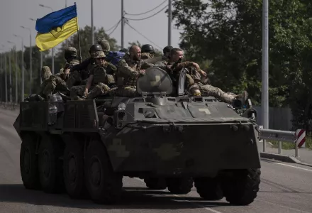 Ukrainian soldiers on a tank in Ukraine during the war with Russia.