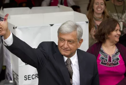 Mexican presidential candidate Andres Manuel Lopez Obrador of the Democratic Revolution Party shows his election ink-stained thumb after casting his vote at a polling station in Mexico City on Sunday, July 1, 2012.
