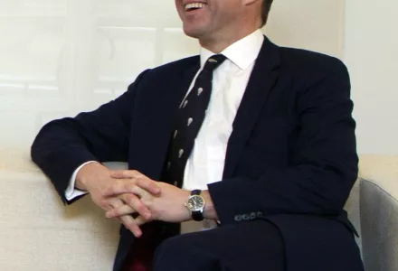 In this January 31, 2011 file photo, Niall Ferguson, Harvard University Professor of History, laughs during a meeting at the Moncloa Palace in Madrid. (AP Photo/Paul White, File) 