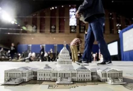A model of the Capitol Building is displayed on a giant planning map during a media tour highlighting inaugural preparations Wednesday, Dec. 14, 2016, at the DC Armory in Washington. (AP Photo/Andrew Harnik)