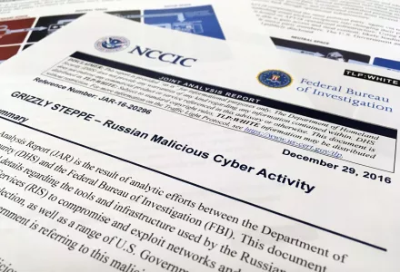 The first page of the Joint Analysis Report narrative by the Department of Homeland Security and federal Bureau of Investigation and released on Dec. 29, 2016, is photographed in Washington, Jan. 6, 2017. Computer security specialists say the technical details in the narrative that the U.S. said would show whether computers had been infiltrated by Russian intelligence services were poorly done and potentially dangerous. (AP Photo/Jon Elswick)