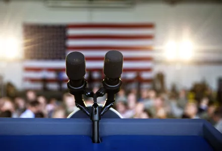 Microphones sit on a podium following Vice President Mike Pence’s speech at an event at Dobbins Air Reserve Base in Marietta, Ga., Friday, June 9, 2017.