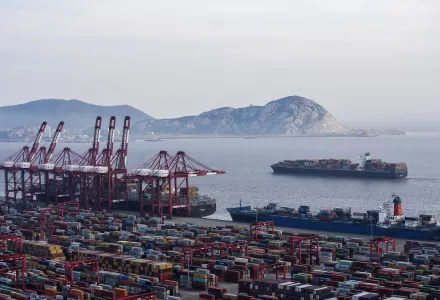 Photo of a container ship docked in Shangahi.