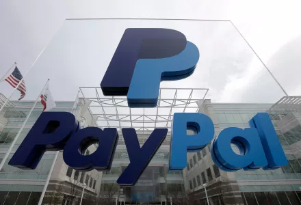 This March 10, 2015, file photo, shows signage outside PayPal's headquarters in San Jose, Calif.