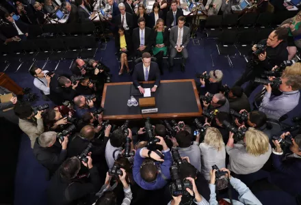 Facebook CEO Mark Zuckerberg arrives to testify before a joint hearing of the Commerce and Judiciary Committees on Capitol Hill in Washington, Tuesday, April 10, 2018