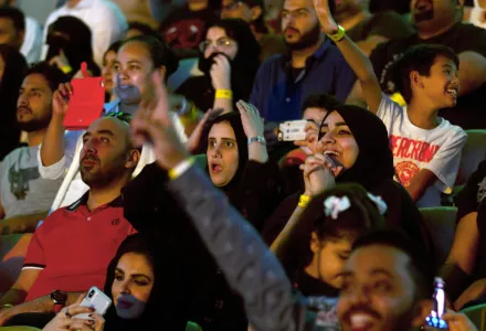 Fans react as they watch the “Greatest Royal Rumble” event in Jeddah, Saudi Arabia, Friday, April 27, 2018. A previous WWE event held in 2014 was for men only, but Friday night’s event included both women and children in attendance. AP Photo/Amr Nabil
