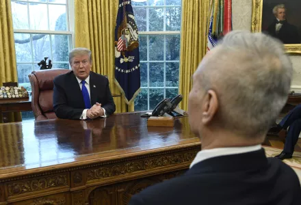 U.S. President Donald Trump speaks with Chinese Vice Premier Liu He about trade relations between their two countries, February 22, 2019.
