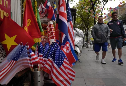 Photo of U.S. and North Korean flags on sale in Hanoi, Vietnam.