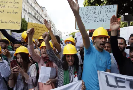 Students carry banners and chant slogans during a demonstration in Algiers, Algeria, Tuesday, April 16, 2019. 