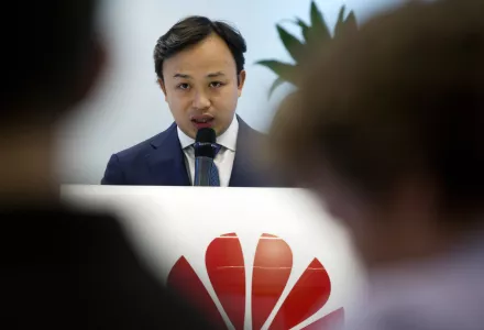 The Chief Representative of Huawei, Abraham Liu, speaks to an audience in Brussels, Belgium during a DigitALL talk, May 21, 2019.