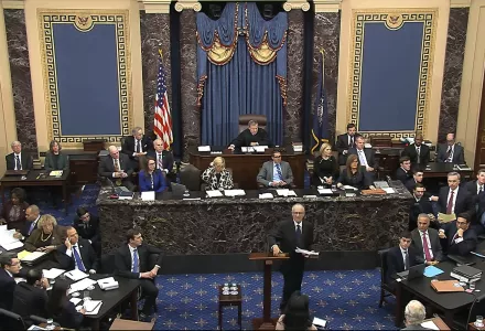In this image from video, Alan Dershowitz, an attorney for President Donald Trump, walks from the podium after speaks during the impeachment trial against Trump in the Senate at the U.S. Capitol in Washington.