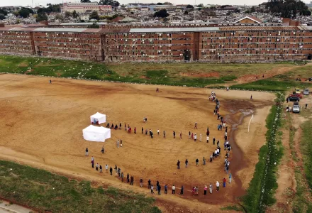 Residents from the Alexandra township in Johannesburg gather in a stadium to be tested for COVID-19 Wednesday, April 29, 2020.