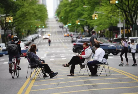 A view of a people practicing social distancing in Amsterdam Ave. during the coronavirus pandemic on May 18, 2020 in New York City. 