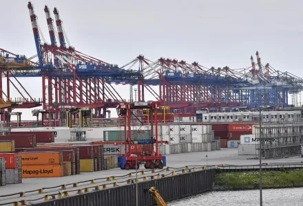 In this Thursday, May 16, 2019 file photo, containers are stored in the free harbor in Bremerhaven, Germany.