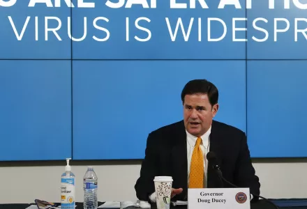 Arizona Republican Gov. Doug Ducey speaks about the latest coronavirus data at a news conference Thursday, June 25, 2020, in Phoenix.