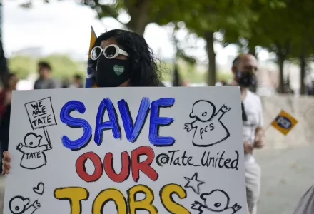 Theatre workers protest outside the National Theatre, against the mass redundancies of low-paid art jobs due to the Coronavirus outbreak, in London, Saturday, Aug. 1, 2020.