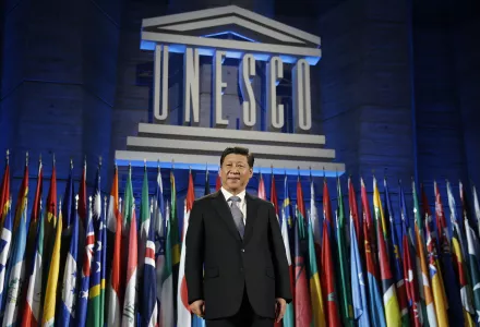 Chinese President Xi Jinping poses for photographers after delivering his speech, during a visit at the UNESCO headquarters, in Paris, Thursday March 27, 2014.
