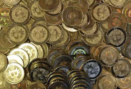 This April 3, 2013 photo shows bitcoin tokens at 35-year-old software engineer Mike Caldwell's shop in Sandy, Utah.