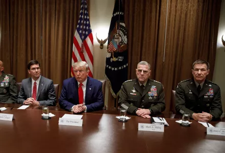 President Donald Trump, joined by from left, Gen. David Berger, Defense Secretary Mark Esper, and Chairman of the Joint Chiefs of Staff Gen. Mark Milley, and Gen. Joseph M. Martin, pauses as he speaks to media during a briefing with senior military leaders in the Cabinet Room at the White House in Washington, Monday, Oct. 7, 2019.