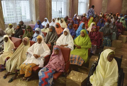 Nigerian schoolgirls sitting in presidential palace