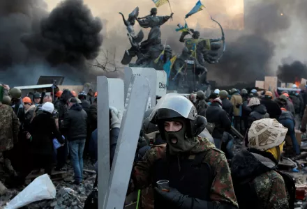 File - In this file photo taken on Wednesday, Feb. 19, 2014, The "Heavenly Hundred" is what Ukrainians in Kiev call those who died during months of anti-government protests in 2013-14. The grisliest day was a year ago Friday _ on Feb. 20, 2014 _ when sniper fire tore through crowds on the capital's main square, killing more than 50 people. A year later, so much has changed. Russia has annexed Ukraine’s Crimean Peninsula, Ukraine has a new president and government, and the country is embroiled in a war in th