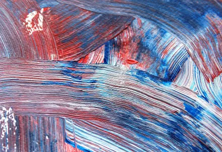 A messy red white and blue paint design