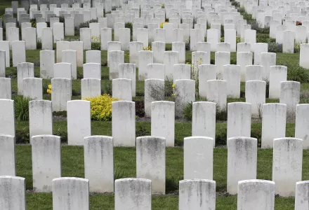 Flowers bloom around graves of World War I soldiers prior to a foundation laying ceremony at Loos British Cemetery in Loos-en-Gohelle, France, Thursday, May 4, 2023. 