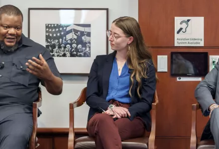 Nnaemeka Ikegwuonu, Morgan Richmond, and Romi Bhatia speak on a panel