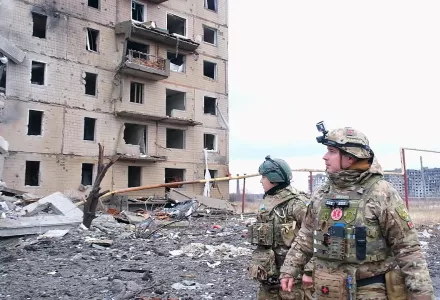 Ukrainian troops examine the destruction caused by Russian shelling in Toretsk, Donetsk Oblast.