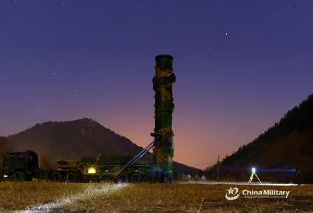 Image of China’s People’s Liberation Army Rocket Force drill with a ballistic missile launcher 