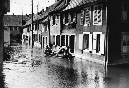 French soldiers paddling from house to house in an inundated western front village searching for food in France on June 7, 1940. The French voluntarily flooded the village in an attempt to hold up the blitzkrieging German army. 