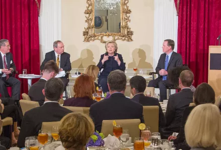 During a luncheon at Harvard, Secretary Clinton, with Professors (from left) Mnookin, Sebenius, and Burns, discusses diplomatic issues she confronted as Secretary of State.