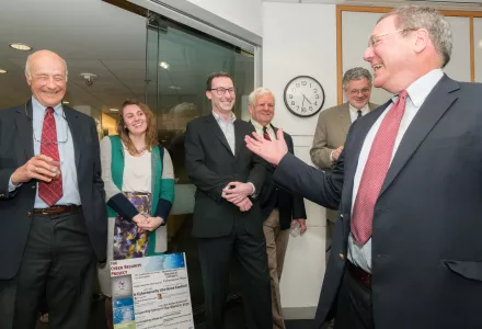 Joseph Nye (left) enjoys comments by David Sanger (right) during a cybersecurity event in Nye’s honor. Also pictured (left to right) Katherine Bjelde, Michael Sulmeyer, Albert Carnesale, and William Hogan.