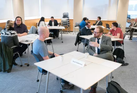 Sharing Expertise: Belfer Center research fellows share career tips and advice with Kennedy School students att a networking event in March.