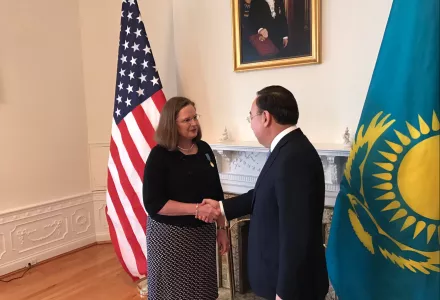 Kazakh Ambassador Erzhan Kazykhanov thanks Ambassador Laura Holgate for her service to his country.