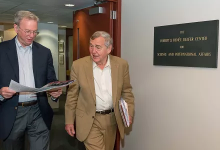 Chairman of Alphabet, Inc. (Google) Eric Schmidt checks out the Belfer Center newsletter with Center Director Graham Allison on the way to a presentation during at a Center Director’s Lunch in May.