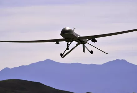 An MQ-1B Predator remotely piloted aircraft passes over the air field during a training mission, Creech Air Force Base, Nevada, May 13, 2013. 